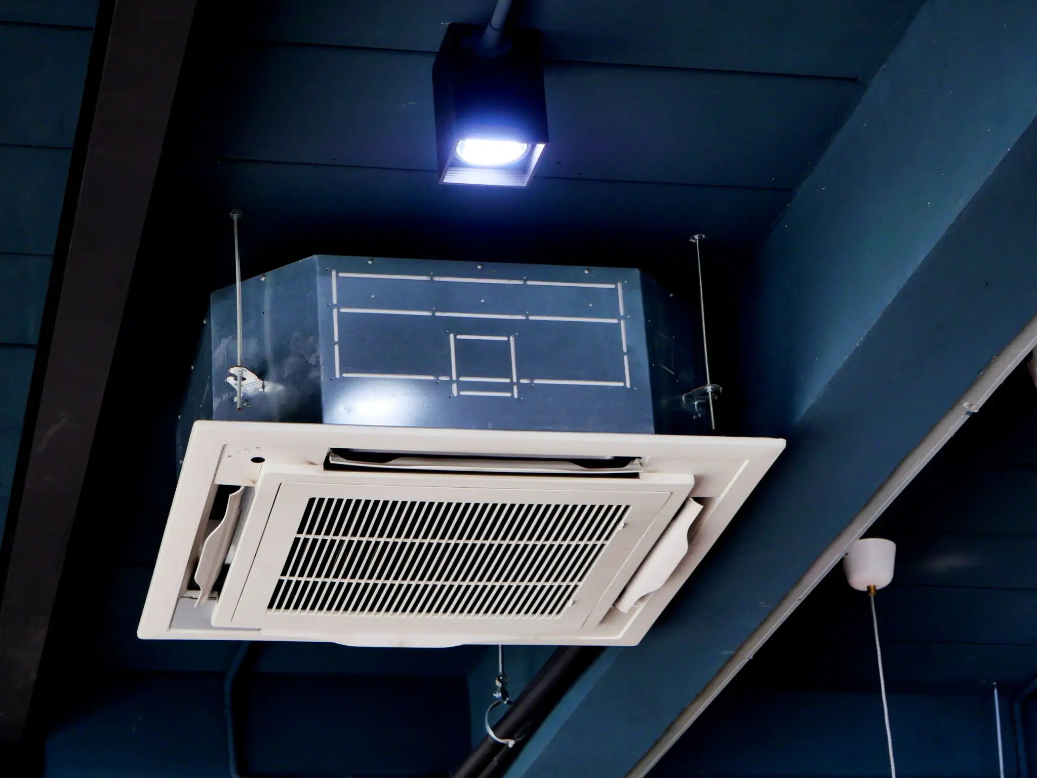 Clean HVAC evaporator coil after UV-C light installation — mold eliminated