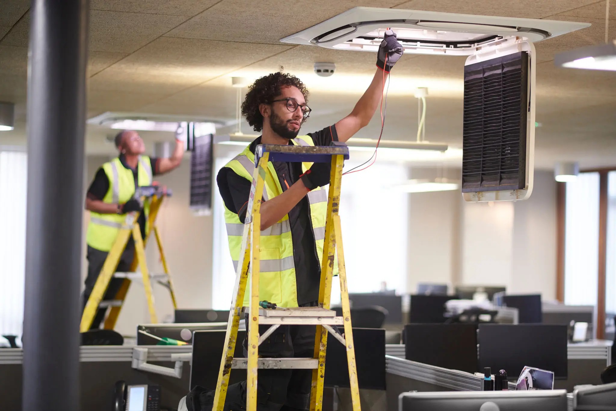HVAC evaporator coil covered in mold and biofilm before UV light installation